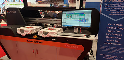 Omni Print Cheetah Dtg Printer that we took a picture of at the SGIA Show.